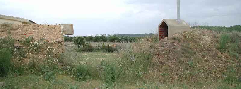 Vista lateral del frente de una bodega y el zarcero posterior de otra